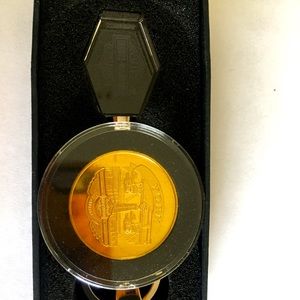 Harley Davidson 100th Anniversary coin (York,PA) and light up key chain.